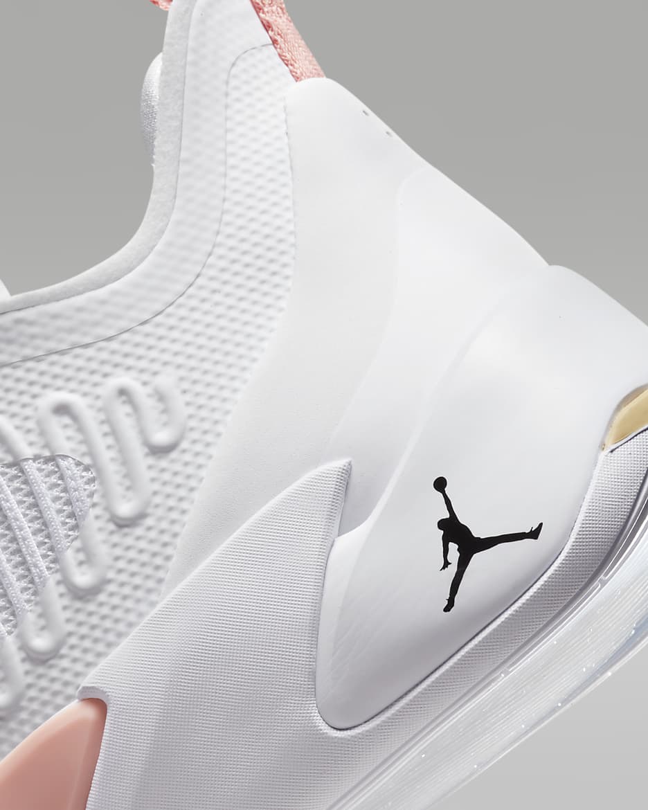White and coral nike shoes 2025